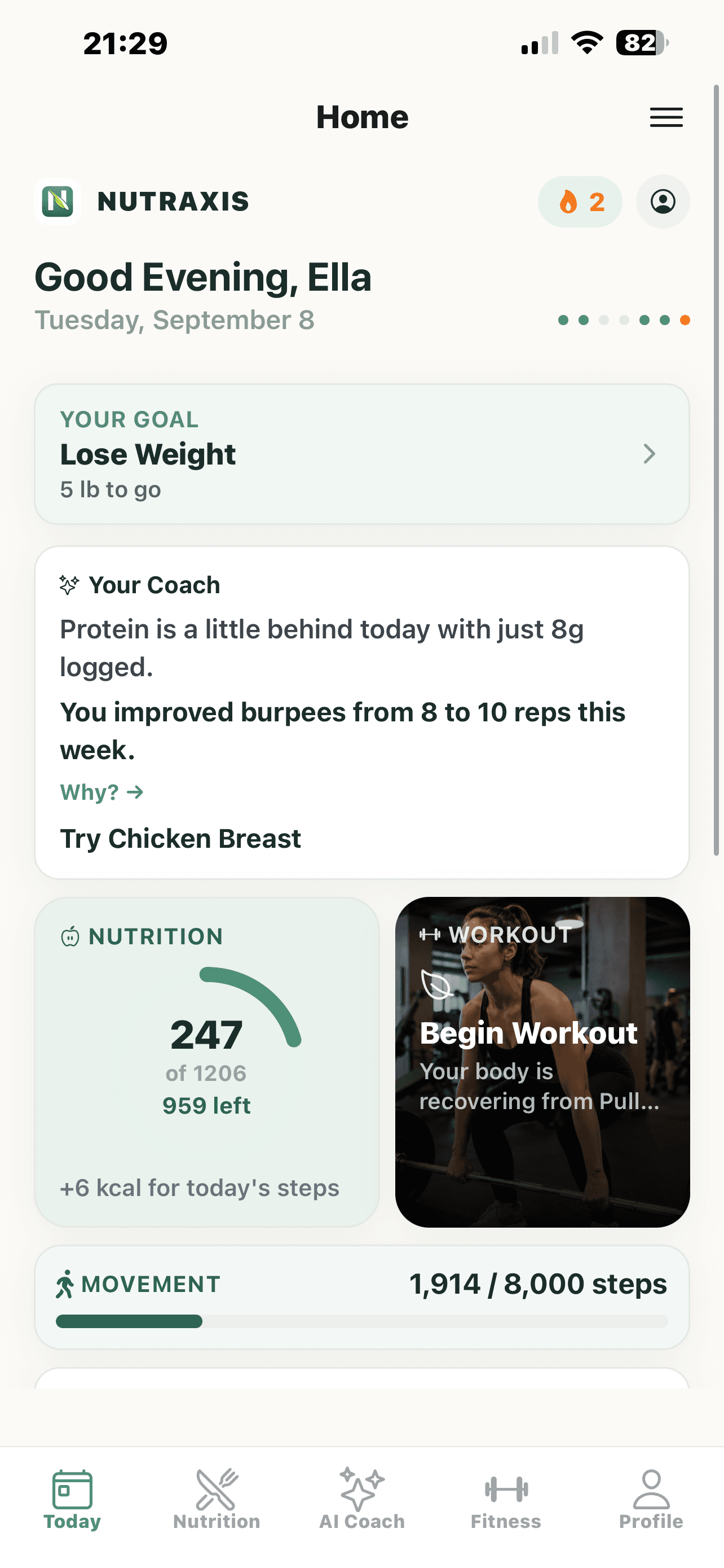 The Nutraxis Home screen, showing today's goal, the AI Coach card, nutrition progress, and a workout suggestion.